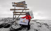 Michael Copeland from Stafford, on his climb up Kilimanjaro with a fridge on his back. The former soldier has conquered Africa's highest mountain whilst carrying a fridge on his back to encourage men to talk about mental health with MIND.
