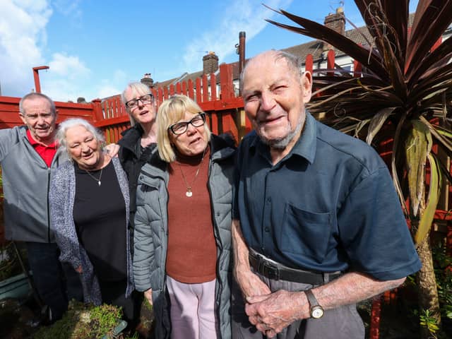 Laurie Blythe, of Fratton, on his 100th birthday. Mr Blythe is pictured with his neighbours, from left, Jim and Pauline Birchall, Gerry Southgate and Anita Stapleton.