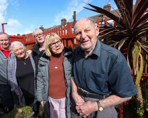 Laurie Blythe, of Fratton, on his 100th birthday. Mr Blythe is pictured with his neighbours, from left, Jim and Pauline Birchall, Gerry Southgate and Anita Stapleton.