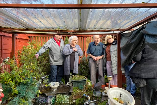 Laurie with neighbours at his beloved pond.