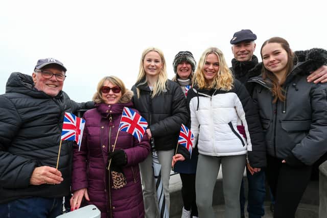 The Smythe family from Lincolnshire at the top of the Round Tower, Old Portsmouth, waiting for HMS Prince of Wales to come home. Picture: Chris Moorhouse (260324-03)