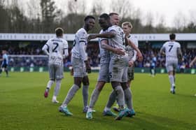 Pompey players celebrate Christian Saydee's goal in the 3-1 success at Wycombe. Picture: Jason Brown/ProSportsImages