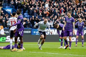 Bolton Wanderers' Aaron Collins celebrates scoring their his hat-trick against Reading. Pic: Richard Sellers/PA