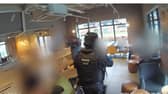 armed police arrest man in Starbucks
