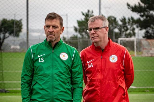 Andy Awford with former Pompey and Manchester United winger Lee Sharpe on duty for Mango Football.