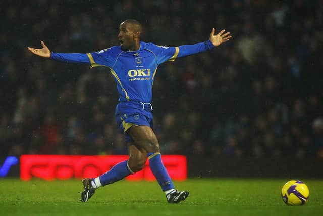 Defoe protests an offside ruling in 2008 at Fratton Park. 