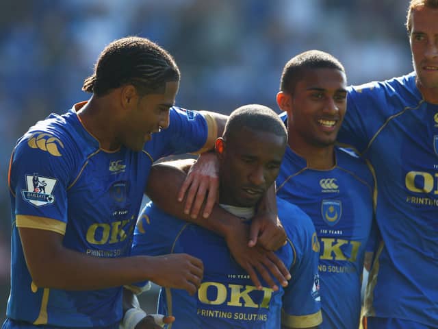 Former Pompey striker Jermain Defoe, centre