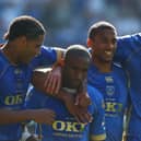 Former Pompey striker Jermain Defoe, centre