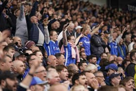 Pompey fans celebrate the winner over Shrewsbury