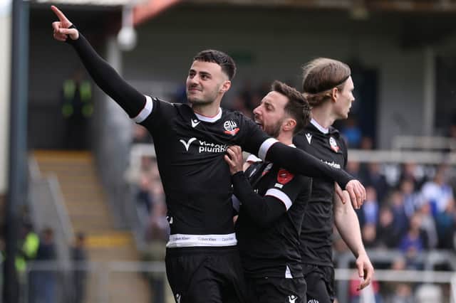 Aaron Collins of Bolton celebrates scoring his side's first goal against Bristol Rovers