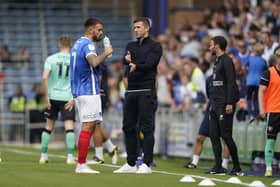 Marlon Pack, left, with Pompey head coach John Mousinho