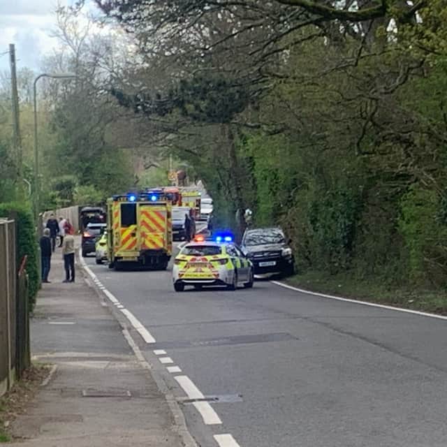 An incident on Durrants Road is causing delays in Rowlands Castle. A car can be seen overturned with emergency services at the scene.