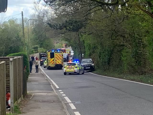 An incident on Durrants Road is causing delays in Rowlands Castle. A car can be seen overturned with emergency services at the scene.
