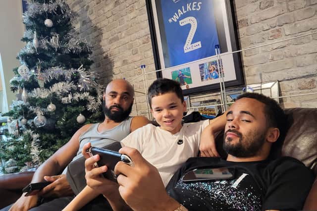 Anton Walkes with his family in their last Christmas together in December 2022. Pictured with dad Lee and brother Anderson.