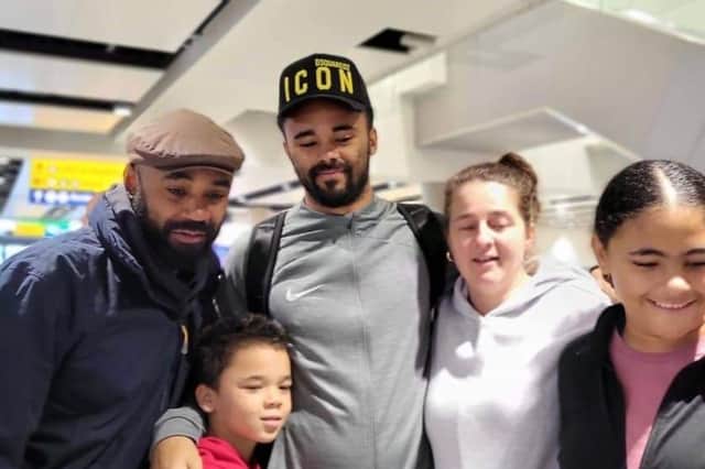 The last photograph taken of Anton Walkes with his family. Pictured at Heathrow Airport in January 2023.