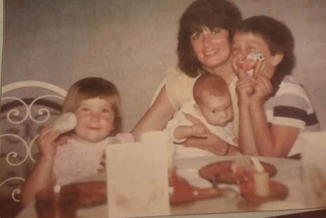 Iain Hoskins, his brother David, and sister Katie with their mother Glenda Hoskins, taken in 1982 in Spain. Pic Iain Hoskins