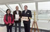 Viking Saturn cruise ship visited Portsmouth International Port on Thursday, April 11, 2024.Pictured is: (l-r) Vanessa Busfield (73) lead meet and greet ambassador at Shaping Portsmouth, Mike Sellers, port director at Portsmouth International Port, Anders Steen, master. Picture: Sarah Standing (110424-361)