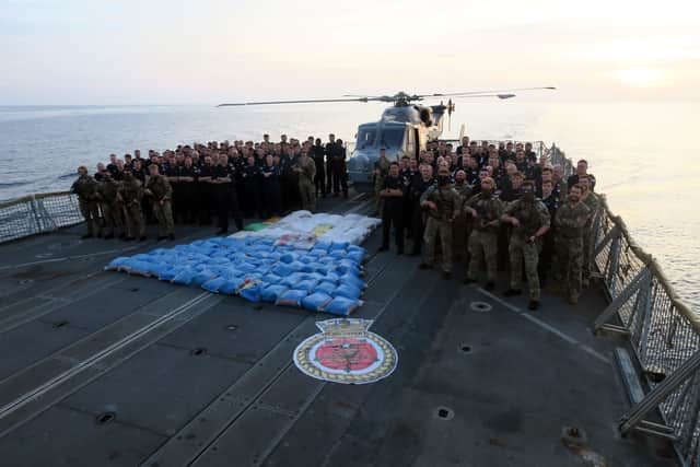 The HMS Lancaster crew with the drugs haul. Picture: Royal Navy