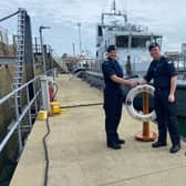 HMS Smiter has a new Commanding Officer following a major refit. From L to R: Former CO, Lt Beth Humby RN, and new CO Lt Samuel Charleston RN. Picture: HMS Smiter