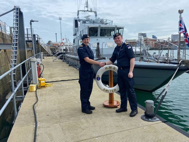HMS Smiter has a new Commanding Officer following a major refit. From L to R: Former CO, Lt Beth Humby RN, and new CO Lt Samuel Charleston RN. Picture: HMS Smiter