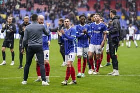 Pompey players salute their fans after the 1-1 draw at Bolton Wanderers.