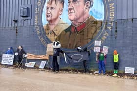 Protesters gather outside Jeremy Clarkson's farm shop in Chadlington, Oxon