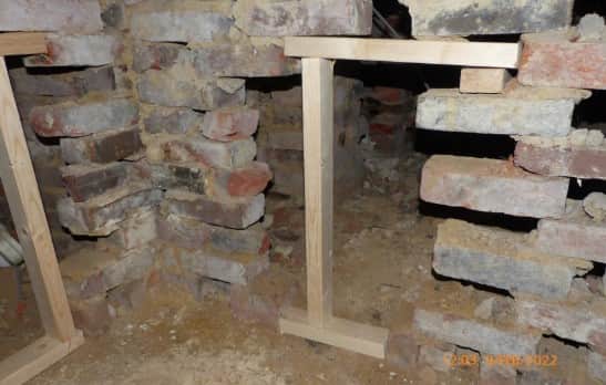 
Timber propping under a property which “serves no purpose”. Pic: Portsmouth City Council 

