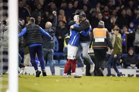 Connor Ogilvie celebrates the goal which won Pompey the League One title. Picture: Jason Brown/ProSportsImages