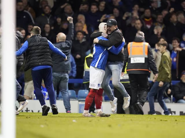 Connor Ogilvie celebrates the goal which won Pompey the League One title. Picture: Jason Brown/ProSportsImages