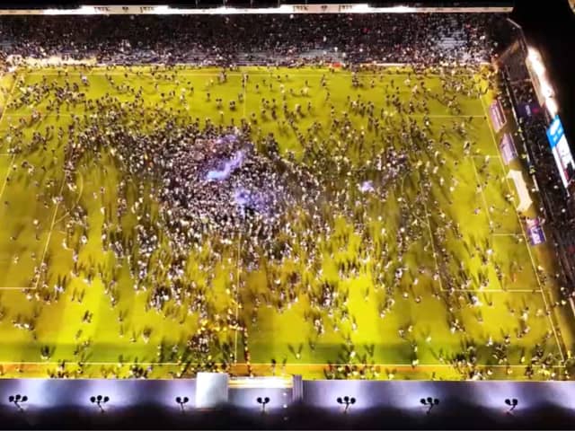 Pompey are crowned League One champions after a nail biting match against Barnsley. Fans stormed the pitch to celebrate the truimph. 
Picture: Marcin Jedrysiak