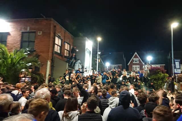 Fan celebrations outside O'Neills in Albert Road, Southsea. on April 16. Police said much of the inside of the bar was damaged, and a staff member was racially abused.