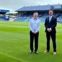 Funding has been secured for a feasibility study to build a bridge from Fratton railway station to The Pompey Centre. Safety concerns had previously been raised, with CEO Andrew Cullen saying a bridge is necessary to expand the North Stand.  Pictured L to R: Portsmouth CEO Andrew Cullen and Portsmouth South MP Stephen Morgan.