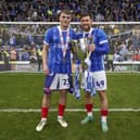 Owen Moxon and Callum Lang savour the League One title. Picture: Jason Brown/ProSportsImages
