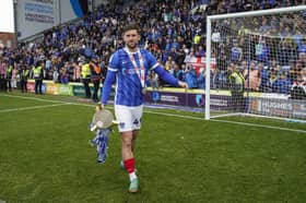 Callum Lang has celebrated his second League One title after joining Pompey from Wigan. Picture: Jason Brown/ProSportsImages
