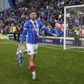 Callum Lang has celebrated his second League One title after joining Pompey from Wigan. Picture: Jason Brown/ProSportsImages