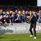 John Mousinho and his Pompey title winners Picture: Peter Nicholls/Getty Images