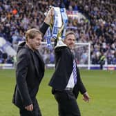 Eric and Breck Eisner celebrate with the League One trophy following Pompey's promotion success. Picture: Jason Brown/ProSportsImages