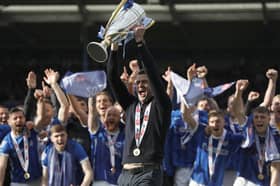 John Mousinho celebrates winning the League One title with Pompey. Picture: Ben Whitley/PA Wire. 