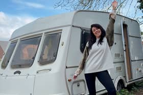 Hayley Rubery in front of her caravan. 