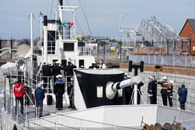 The Last Post is played during an Anzac Day service of remembrance on board HMS M.33, the sole-surviving ship from the Gallipoli campaign