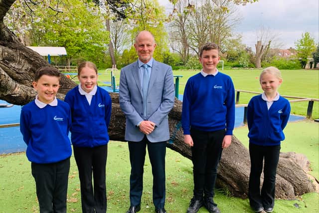 Pictured: Nick Cross with (left to right) Charlie, Sophia, Alex, Amelia from Gomer 