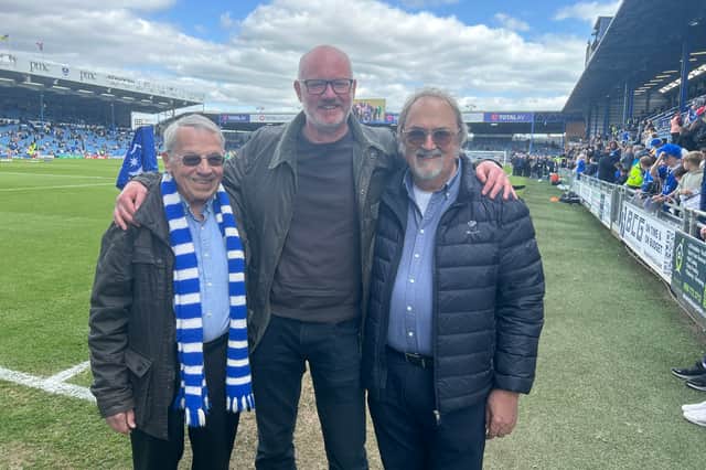 Mark Trapani (far right), was reunited with Mick Williams and Ashley Brown at Fratton Park against Wigan.