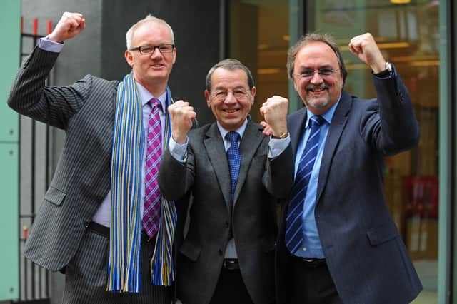 Mark Trapani joins Ashley Brown and Mick Williams celebrating saving Pompey at the High Court in April 2013. Picture: Sarah Standing