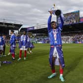 Chelsea loanee Tino Anjorin celebrates Pompey's League One title win. Pic: Jason Brown.