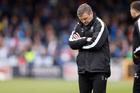 Lincoln City boss Michael Skubala in the 2-0 defeat to Pompey. Pic: Richard Sellers/PA Wire.