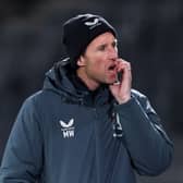 MK Dons manager Mike Williamson is being eyed by promotion hopefuls