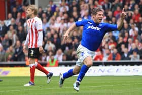 Pompey midfielder David Norris celebrate's his 90th-minute equaliser against Southampton at St Mary's when the two sides went head-to-head in the Championship in April 2012