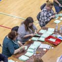 Counting ballot papers at Gosport Leisure Centre. Picture: Mike Cooter (030524)
