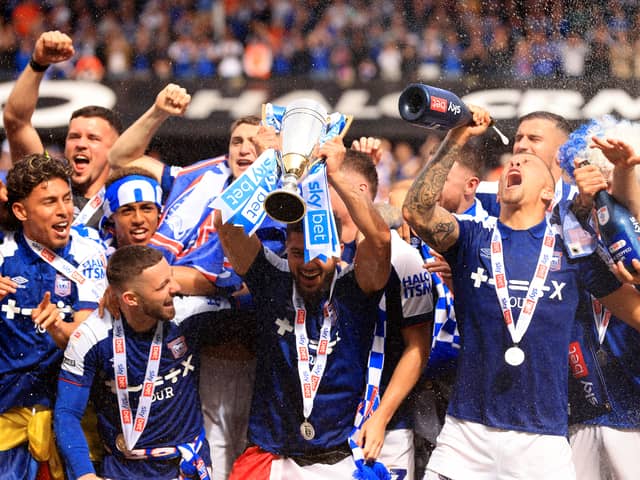 Ex-Pompey favourites Conor Chaplin (bottom left) and George Hirst (top left) celebrate promotion to the Premier League. Picture: Stephen Pond/Getty Images