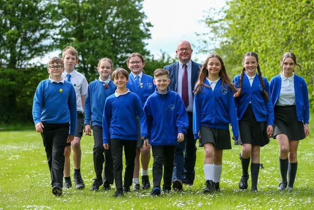 Headteacher Mr Justin Bartlett with Heads of House. Castle Primary School, Portchester, has been rated as Outstanding in their latest Ofsted report
Picture: Chris  Moorhouse (030524-09)